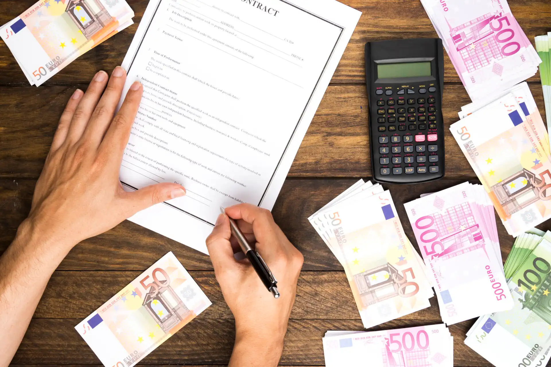 Top view of man signing contract